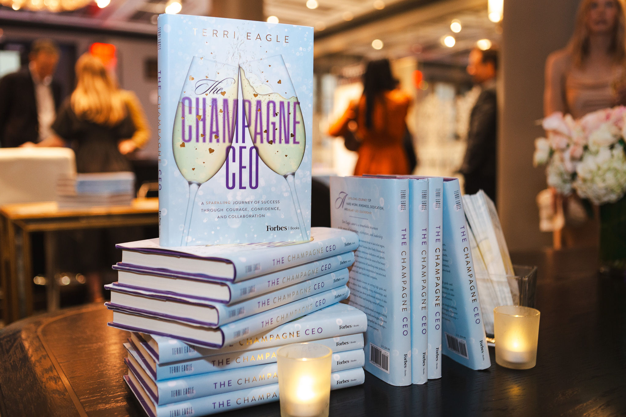 The Champagne CEO by Terri Eagle | Amazon Bestselling Forbes Books Leadership Book The Champagne CEO by Terri Eagle displayed at a Forbes Books event, showcasing the Amazon bestselling leadership book on executive communication, business transformation, and organizational growth.