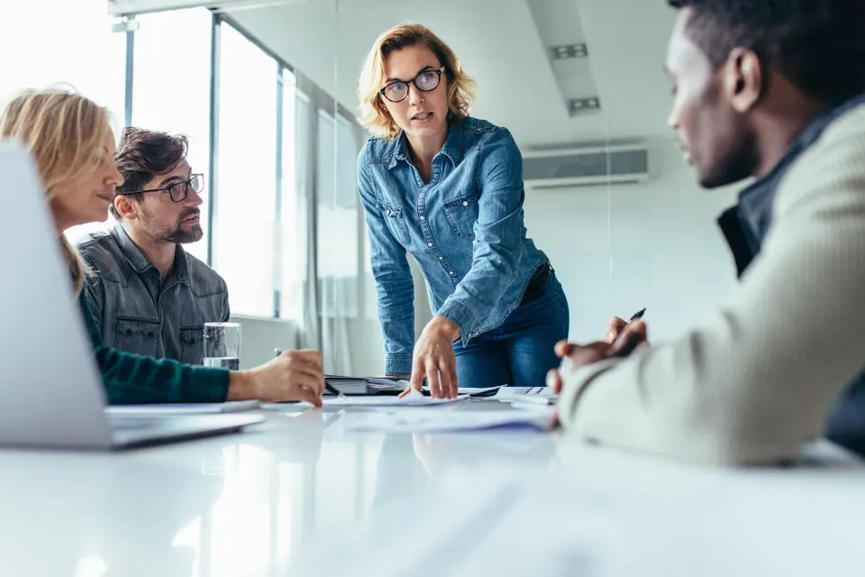 Hands-on CEO leading a team meeting to strengthen collaboration, improve decision-making, and drive sustainable business growth.