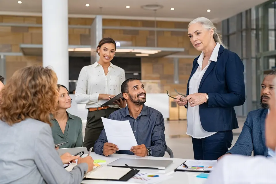 Fractional C-suite executives collaborating with a business leadership team to provide strategic guidance, executive expertise, and sustainable business growth.